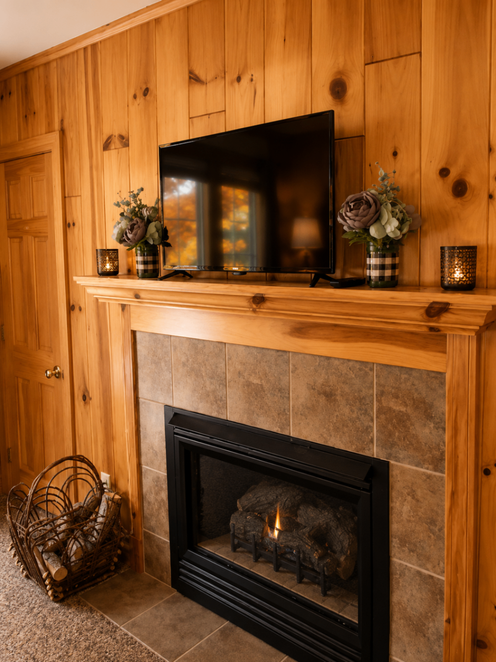 Gas fireplace beneath a television